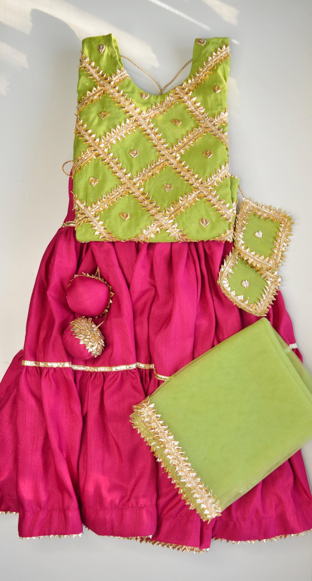 Checkered Apple Green Magenta Lehenga Choli Set | Choices Unlimited Choices Are Unlimited Checkered Apple Green Magenta Lehenga Choli Set | Choices Unlimited Choices Are Unlimited